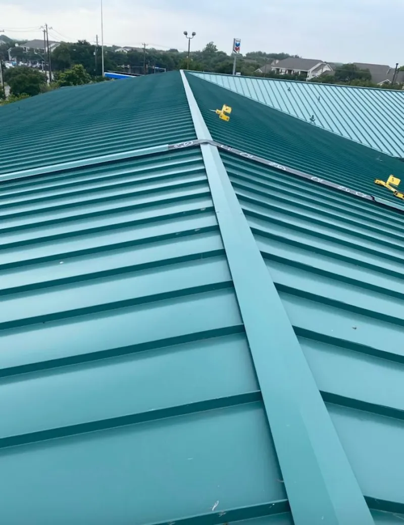 Green commercial metal roof ridge and valley for Metal Roof Repair in Long Lake